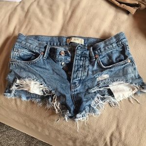 Free People destroyed denim shorts